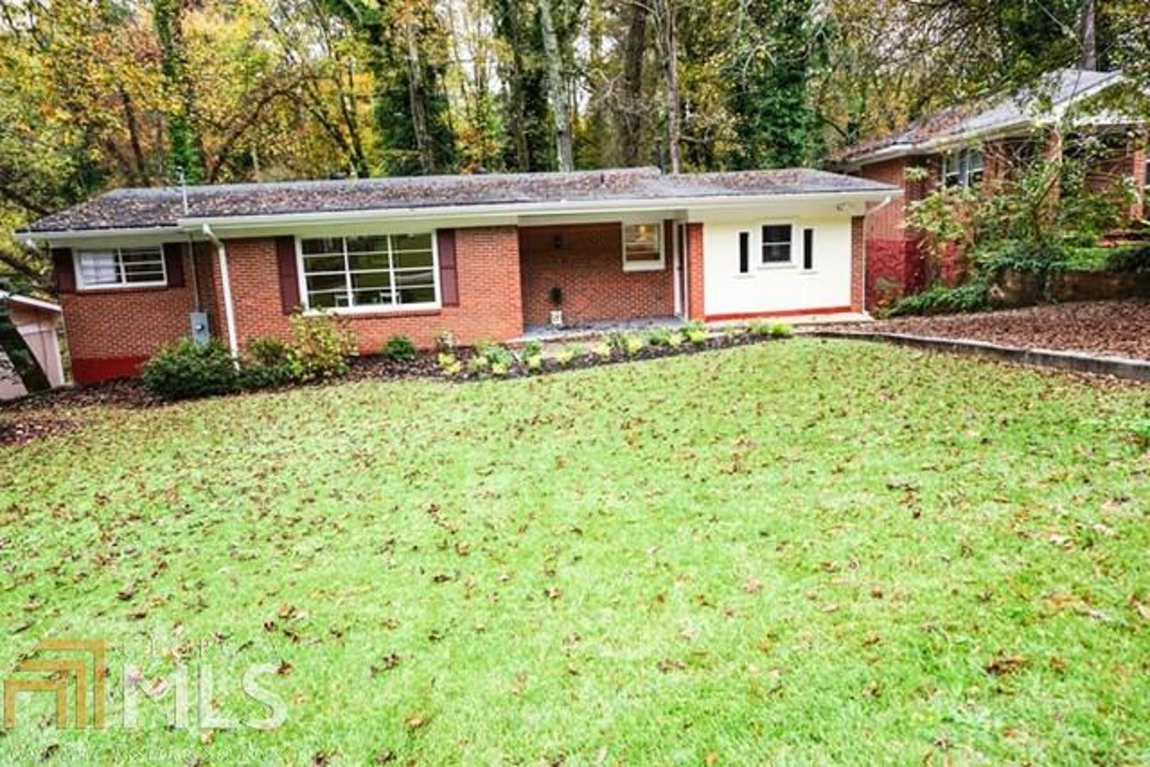 **Less than 3 miles from Downtown Decatur**This Ranch style 4 bedroom, 2 bath Features a open breakfast/kitchen area w/ Granite counter tops and bonus room that can be used as an art studio or an office. Includes Hardwood floors throughout and Daylight Basement, Huge Backyard!