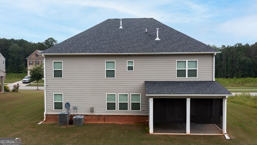 Photo of 8084 Louis Drive, Locust Grove, GA 30248 (MLS # 10705351)