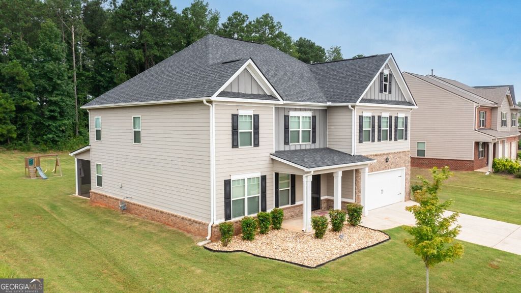Photo of 8084 Louis Drive, Locust Grove, GA 30248 (MLS # 10705351)