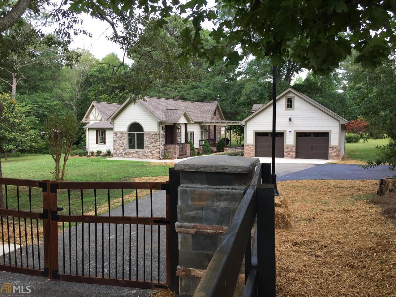 Craftsman custom built Garden Villa.On 2.84 acres Fully fenced with main gate,with second gate option on Air acres lane.enjoy walking and viewing this amazing garden setting.Surrounded with trees, water well that is designated to the garden,distributes water through out the property.park like setting, lighting, walking trails and more.This 3 bedroom 2 and half bath home has all the luxury and class you're looking for,Many additional features.custom built kitchen,with high grade windows/doors, ceilings over 10ft.Over sized detached Insulated garage,With carriage doors.