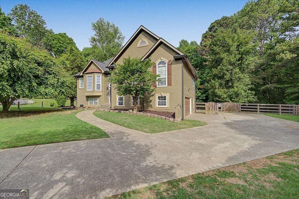 Photo of 409 Windsor Way, Canton, GA 30115 (MLS # 10763154)