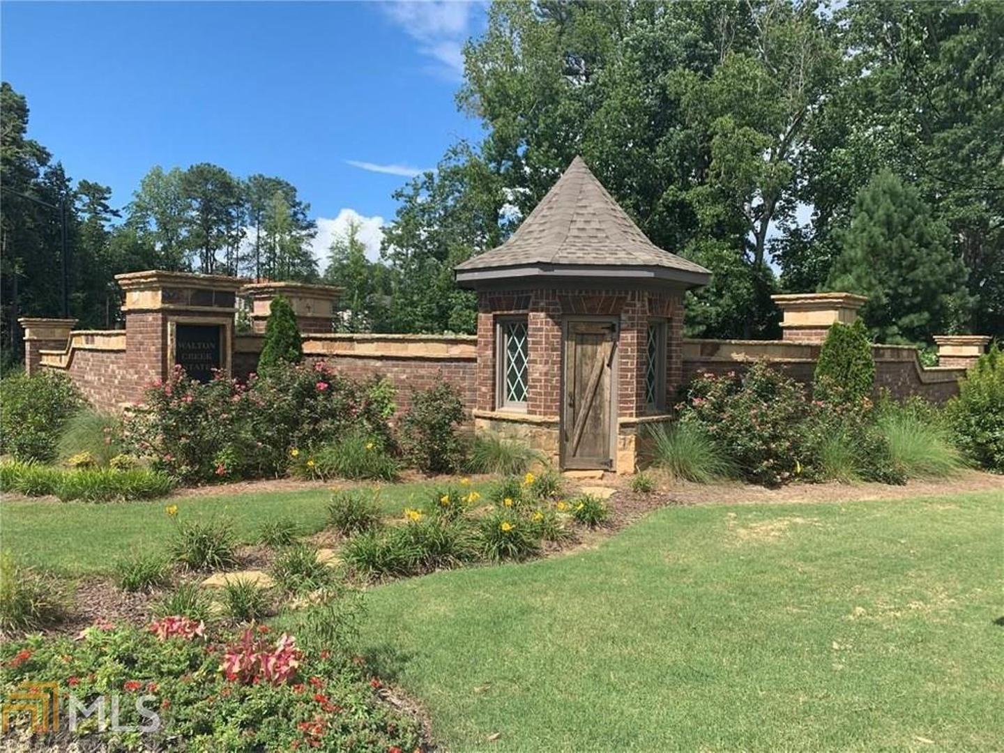 New construction in Walton high district. Located in a new subdivision with 21 luxury homes. Easy access to I-75, shopping, restaurants and fitness center. 4-side brick & stone exterior. Open floor plan. Every bedroom has its own private bath & walk-in closet. Full finished daylight basement with full kitchen and lots of windows overlooking private flat backyard. Gourmet kitchen features over-sized island, 48" gas range with griddle & walk-in pantry. Large master with fireside sitting area and a huge walk-in closet! Guest bedroom with ensuite full bath on main.