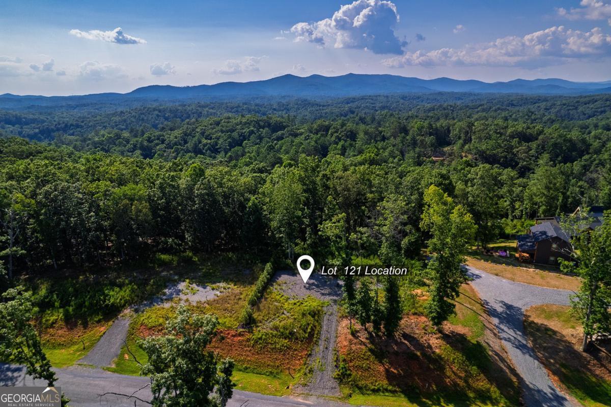 Welcome to one of North Ga's most sought after developments, Jake's Landing Overlook! This gated community offers peaceful tranquility with gorgeous mountain views. Just 5 minutes (1.6 miles to ramp) to Carter's Lake and with RV friendly covenants, you are free to enjoy nature from your own back yard with flexibility. Future plans include a private pool, pavilion, nature park with fire pit area, community areas and a kayak launch. All underground utilities, community water, and fiber internet available, AND Short Term Rentals are allowed. Just minutes from downtown Ellijay to enjoy dining, shopping, and a multitude of Wineries.