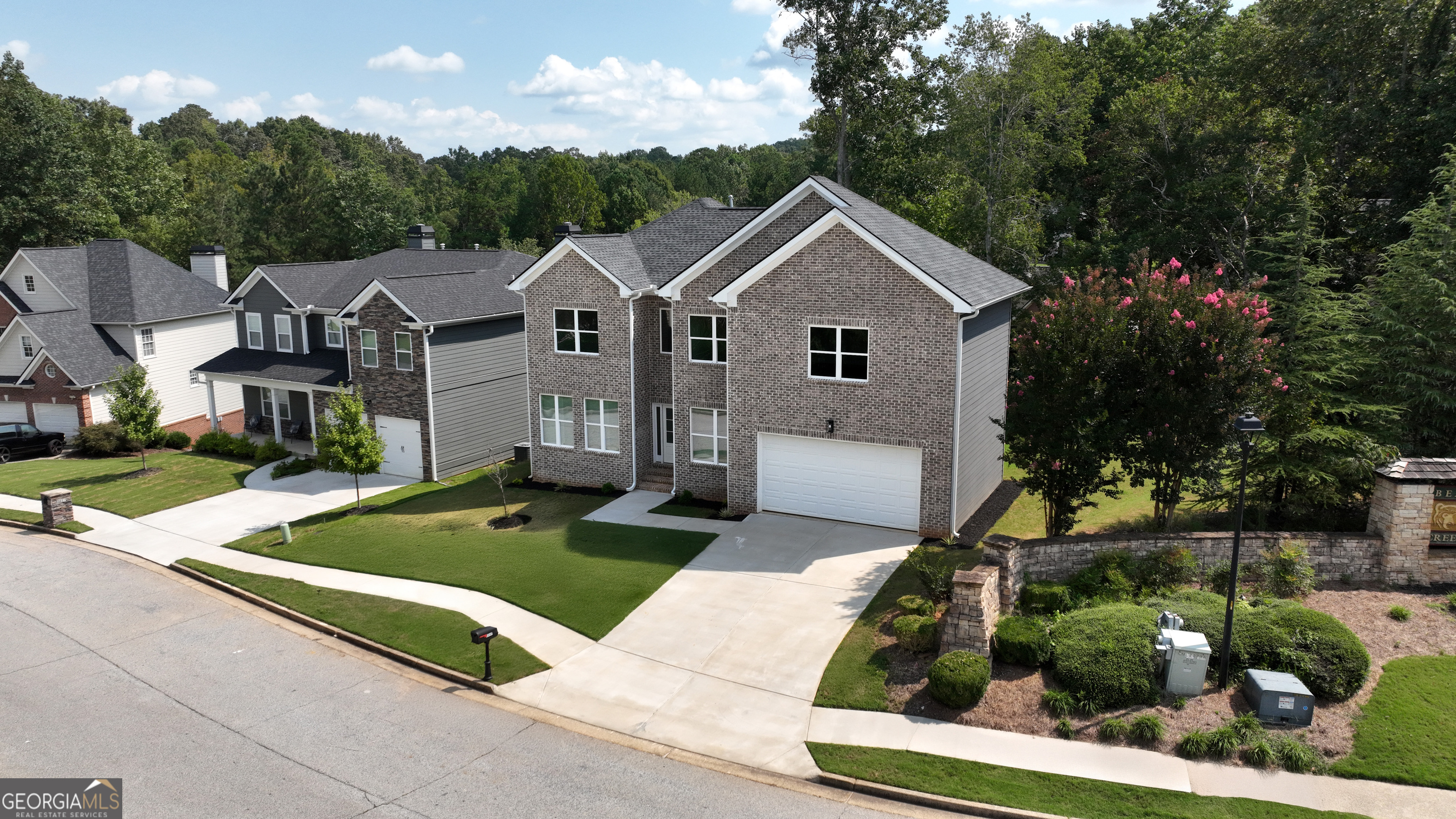 ***Check with listing agent about builder incentives to make this house yours!*** This NEW CONSTRUCTION, custom-built home, blends elegance and luxury, flexibility, and modern convenience in every detail. The open-concept floor plan creates an airy flow, enhanced by high-end finishes that set the tone for sophisticated living. At over 4000sf, there is plenty of room for all your living, entertaining, and functional needs on every level. With TWO MASTER SUITES, the home offers rare versatility-whether as a private in-law retreat, a guest haven, or a dual-owner layout. One suite is located on the main floor for easy access, while the second, upstairs, provides added privacy. Outdoor living is elevated with an EXPANSIVE DECK showcasing sweeping views-perfect for entertaining or quiet evenings. A level side yard extends the possibilities, offering space for recreation, gardening, or future enhancements. The WALKOUT, DAYLIGHT BASEMENT is a true canvas, ready to be transformed into anything imagined: a home theater, wellness center, game lounge, additional bedrooms, or even a complete secondary living space. With its blend of luxury, adaptability, and lasting quality, this home isn't just move-in ready-it's future-ready. Enjoy years easy living with new construction and all the benefits of luxury at an affordable price!