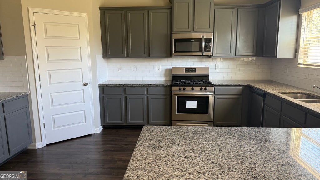 Photo of 505 Emporia Loop, McDonough, GA 30253 (MLS # 10875216)