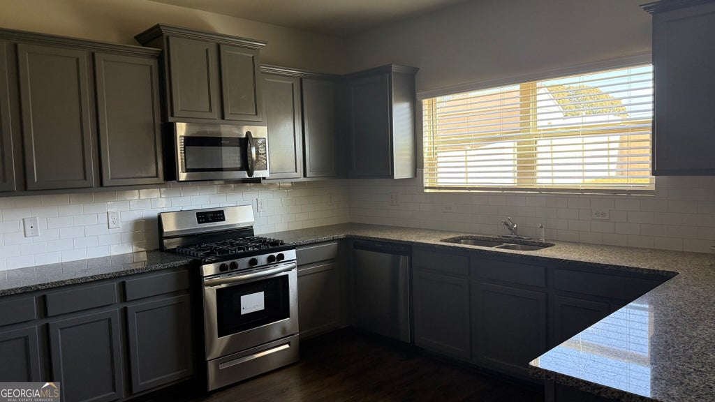 Photo of 505 Emporia Loop, McDonough, GA 30253 (MLS # 10875216)