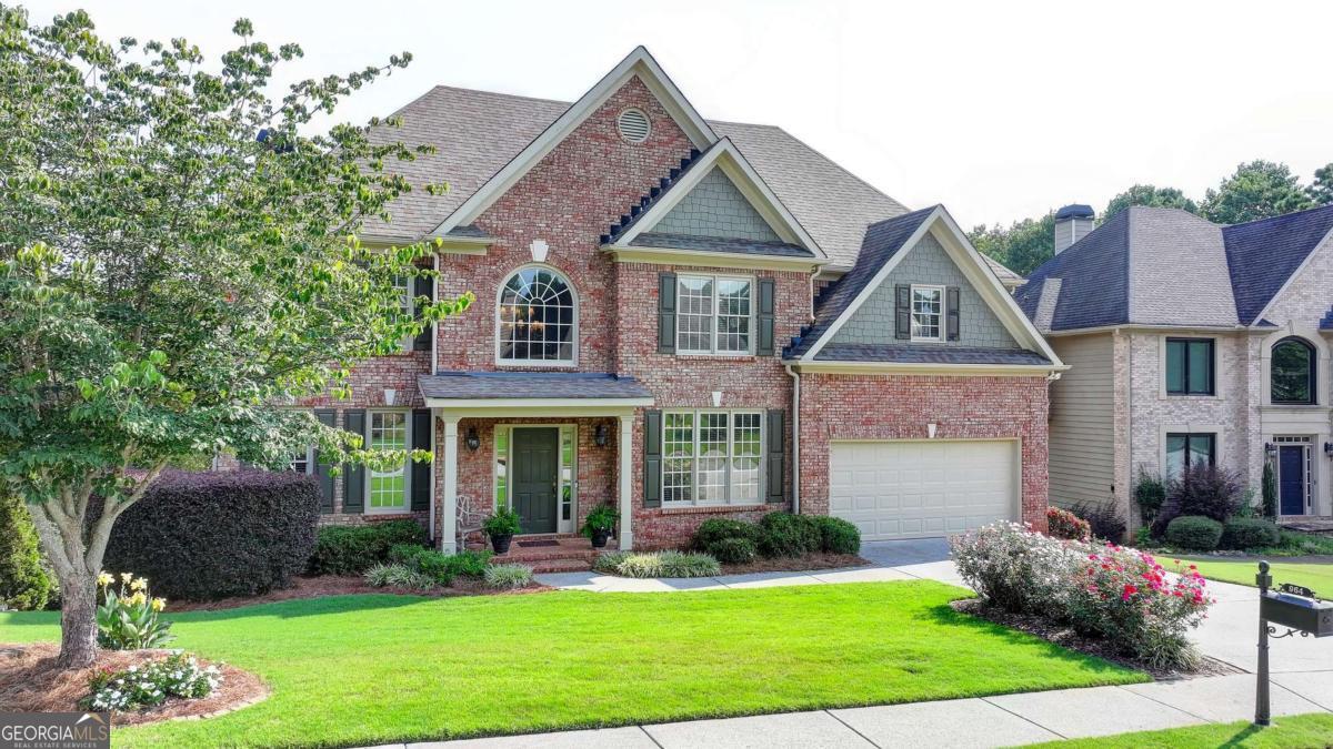 Executive style 5 bedroom, 4 and a half bath home with a finished basement located in Riverside at Apalachee Farms. The covered front porch opens to a grand two-story foyer. Beautiful hardwood floors throughout the main level. Spacious full dining room with coffered ceiling and wainscoting. Separate sitting room or formal living room. COMPLETELY RENOVATED KITCHEN features quartz counters, updated cabinets, stainless steel appliances, gas range, recessed lighting, and stainless steel ventilation hood. Large walk-in pantry. Massive laundry room off of the kitchen includes a sink and laundry shoot from the primary bedroom closet. Open concept to the breakfast area and family room. Wall of windows across the back of the house provide a stunning view of the pond, rear deck, and trees. Family room features recessed lighting, stone fireplace with gas logs, and built-in shelving. The primary bedroom suite includes a trey ceiling and spa-like bath with double vanities, whirlpool tub, separate shower, and walk-in closet with closet system. Three spacious additional bedrooms upstairs. The basement is perfect for entertaining and includes a TV room, beautiful slate floors, stone fireplace, and coffered ceiling. Wet bar with granite counters. Fifth bedroom, full bath, and a workroom/storage area round out the basement. Large back deck and underneath patio with fountain provide a peaceful setting to enjoy the view of the pond. The sought after Apalachee Farms community provides tennis courts, pickleball, Junior Olympic swimming pool, kiddie pool, hot tub, waterslide, and a clubhouse available for your next big event. Optional membership to the Trophy Club at Apalachee is just around the corner. The location is minutes to Highway 316, I85, dining/shopping at the Mall of Georgia, Hebron Christian Academy, other great local schools.