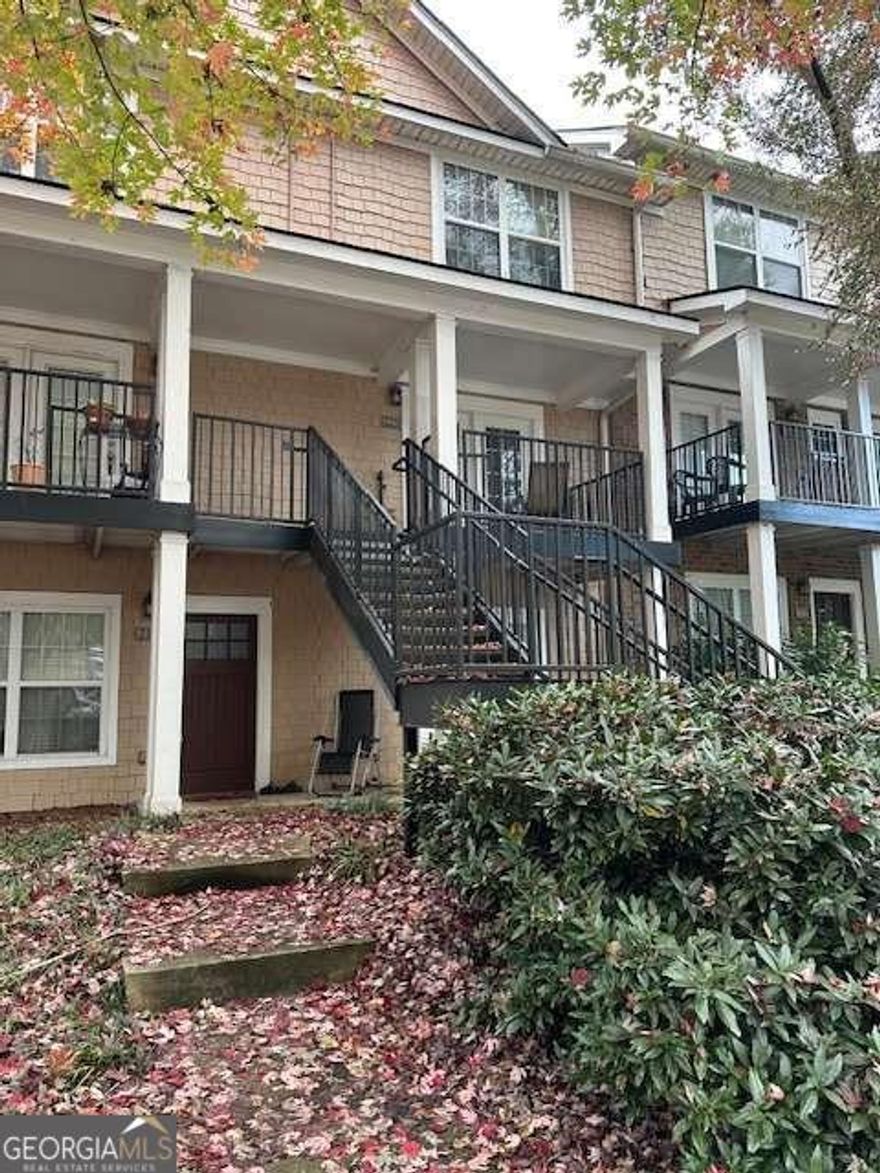 Nice 2 BR/2.5 BA Townhouse style upper level condo.  Rented through July, 2026, at 1600/month and professionally managed. Great for buyers who don't need occupancy until next August.  Assume lease and have income until August. Laminate wood floors in common area and carpet in bedrooms.  Hot water heater replaced October 2021.   Laminate floors in common area.  Spacious bedrooms with vaulted ceilings and private baths upstairs.  Main level offers 1/2 bath for guest.  Great location close to public bus stop.  Summit of Athens is a gated community with resort style amenities.  Clubhouse with fitness center, gathering areas.  Other amenities include huge pool, basketball/tennis/sand volleyball courts.   Note:  Photos are without tenant furnishings.  Also, Summit of Athens does not allow nightly/weekly rentals.