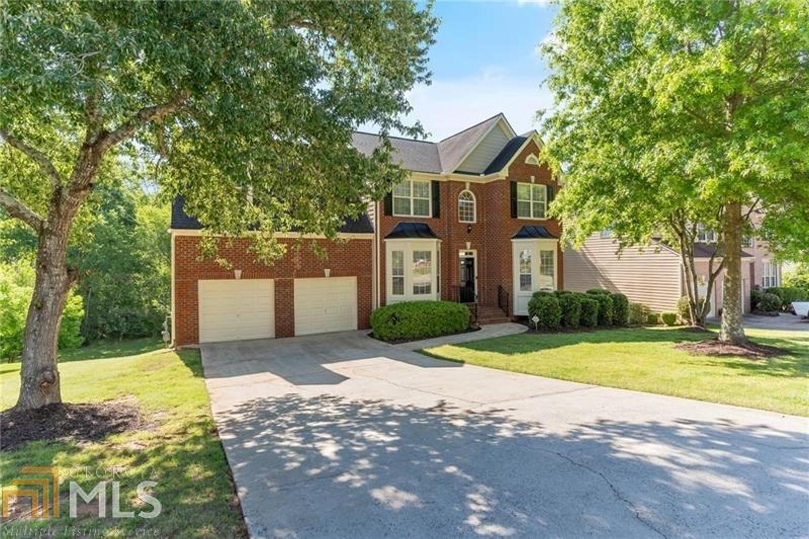 Talk about the deal of the day this charming brick traditional on coveted private lot nestled within the neighborhood. Lovingly maintained your new home offers beautiful updates and quality capital improvements! Come home to this close in Mableton location! I am in love with streaming natural light that flows generously through the two-story great room. The kitchen offers real oak cabinetry, stone counters and stainless appliances. Upstairs be prepared to be impressed by the master suite that offers large separate sitting room, perfect for home office area, exercise or your private retreat to get away and enjoy views of the wooded lot. The master bath features update vanity with quartz countertop and walk in closet. The guest bedrooms are roomy, and the layout offers separation and privacy. Looking for a finished terrace level with custom built in bar, billiard room and recreations areas? This size and finish level is unheard of at this price in the location. Nice size deck overlooks expansive lot. Be prepared to be wowed and stand in line to get into this home! This hotcake is going to fly off the market!