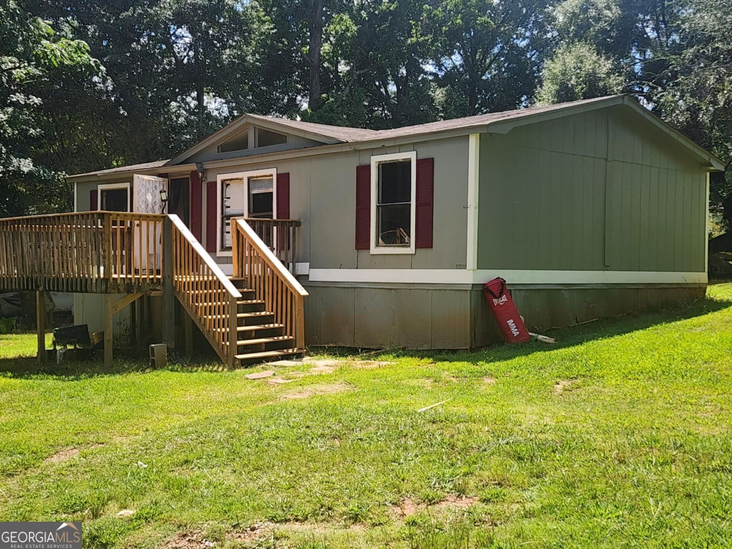 Wonderful opportunity to own this 3 bedrooms 2 bath home. Features family room with spacious kitchen and ample cabinets. Needs some TLC with lots of potential. The lot is fenced the home has a large front deck. Great opportunity for a new homeowner looking add value to a home or add to their investment portfolio.