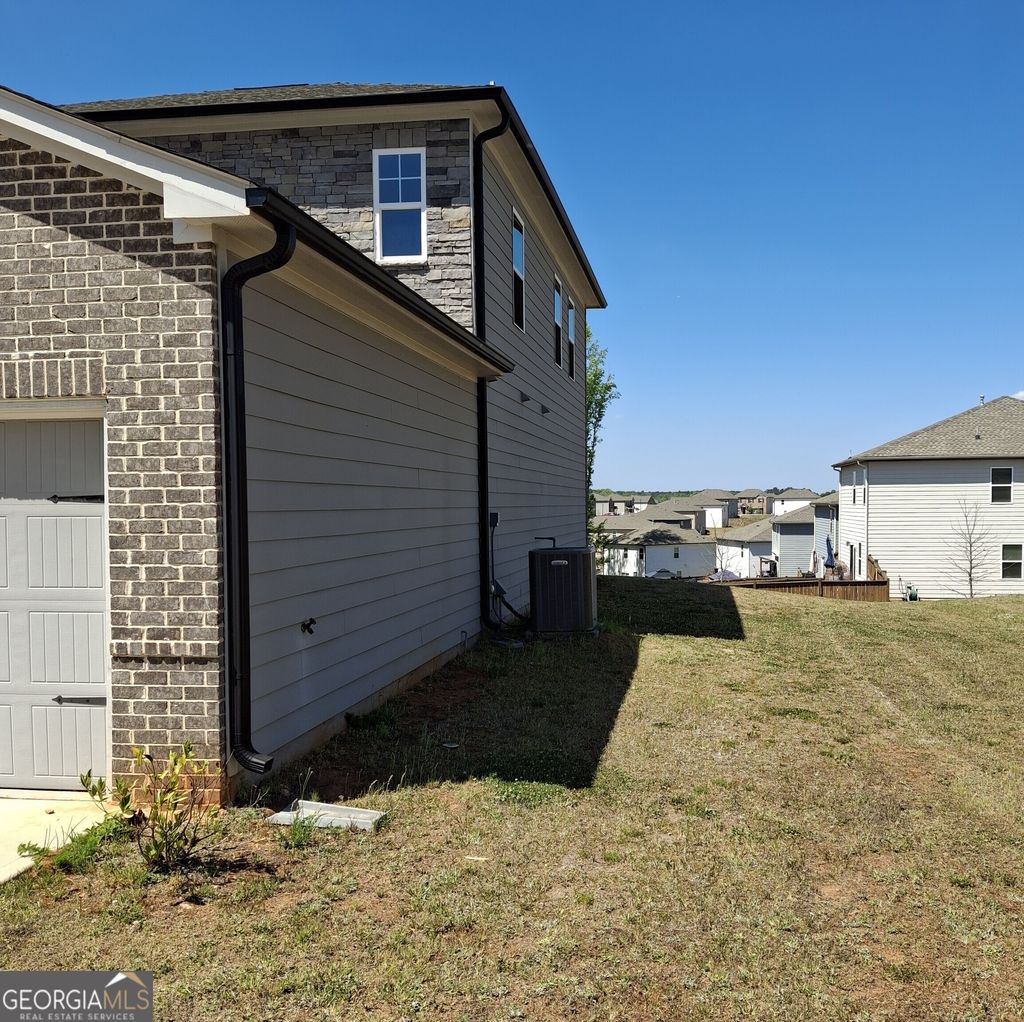 Photo of 368 Amsterdam Way, Hampton, GA 30228 (MLS # 10742502)