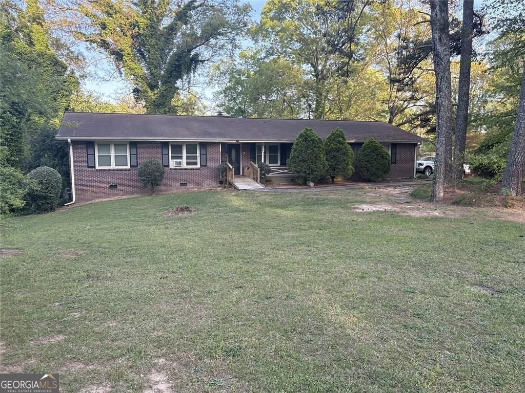 Photo of 524 Rowland Road, Stone Mountain, GA 30083 (MLS # 10737051)