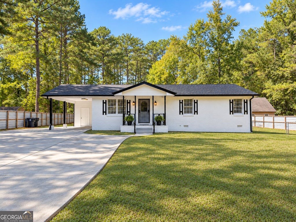 Photo of 1825 Jordan Hill Road, Griffin, GA 30223 (MLS # 10848510)