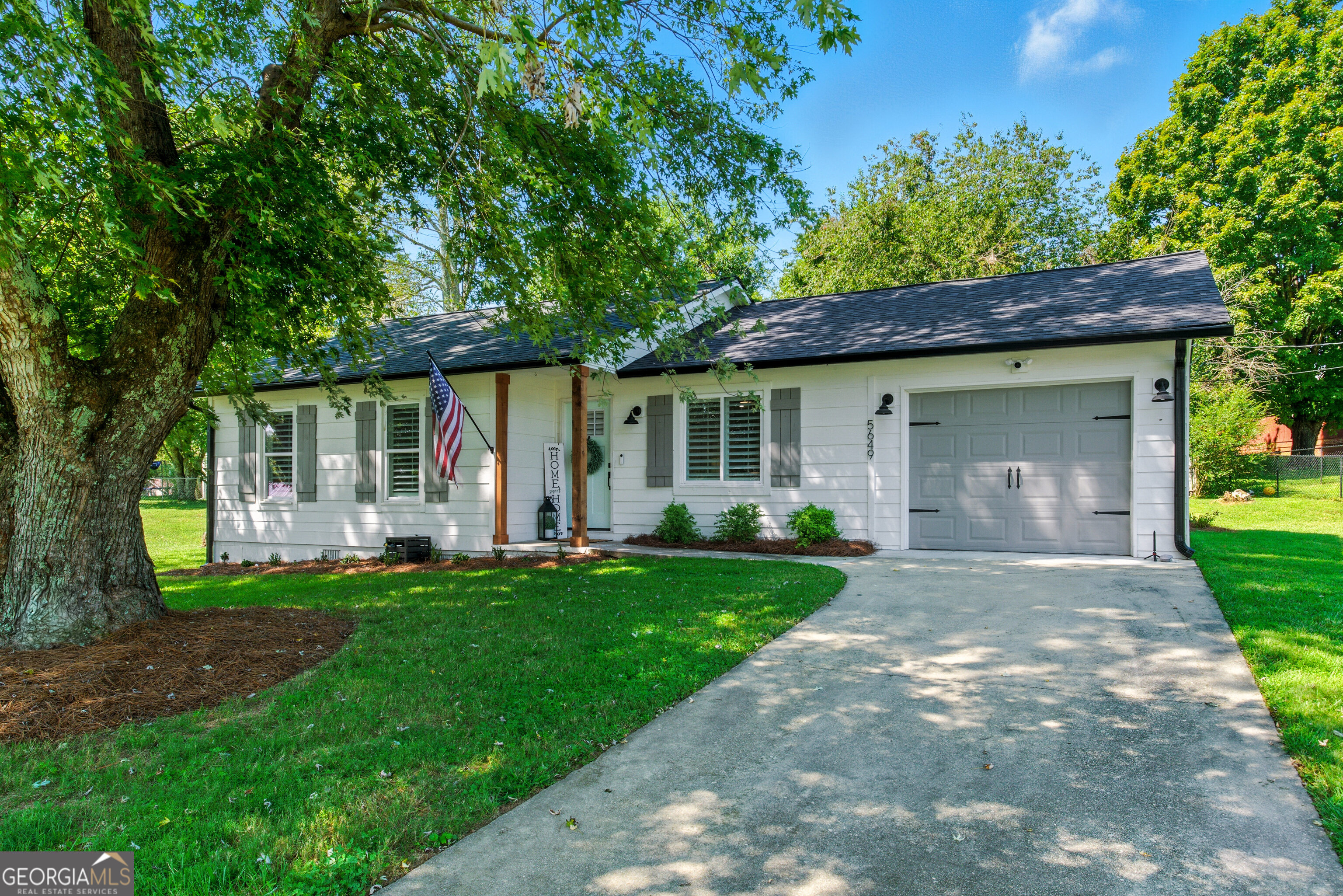 Welcome to this beautifully upgraded ranch-style home, offering peace of mind with a full remodel in 2023 and numerous high-end improvements added by the current seller. Sitting on a spacious .42 acre lot, this property has been thoughtfully reimagined with style, functionality, and modern convenience in mind. Recent upgrades include a brand-new garage with a WiFi-enabled smart door, outdoor lighting with a wired security camera and floodlight, new roof and gutters, and a full wooden privacy fence for backyard enjoyment. The exterior also boasts a new front door, cedar porch columns, and double back doors leading to the deck. Inside, the home shines with LVP flooring throughout, fresh paint, and energy-efficient windows. The kitchen features quartz countertops, a WiFi oven with a fully functional hood vent, and a dedicated laundry room and pantry enclosed with bifold doors. Bathrooms have been fully updated with new vanities and fixtures, while additional improvements include a new water heater, WiFi thermostat, and vapor barrier in the crawl space. Every major system, finish, and detail has already been addressed-simply move in and enjoy!