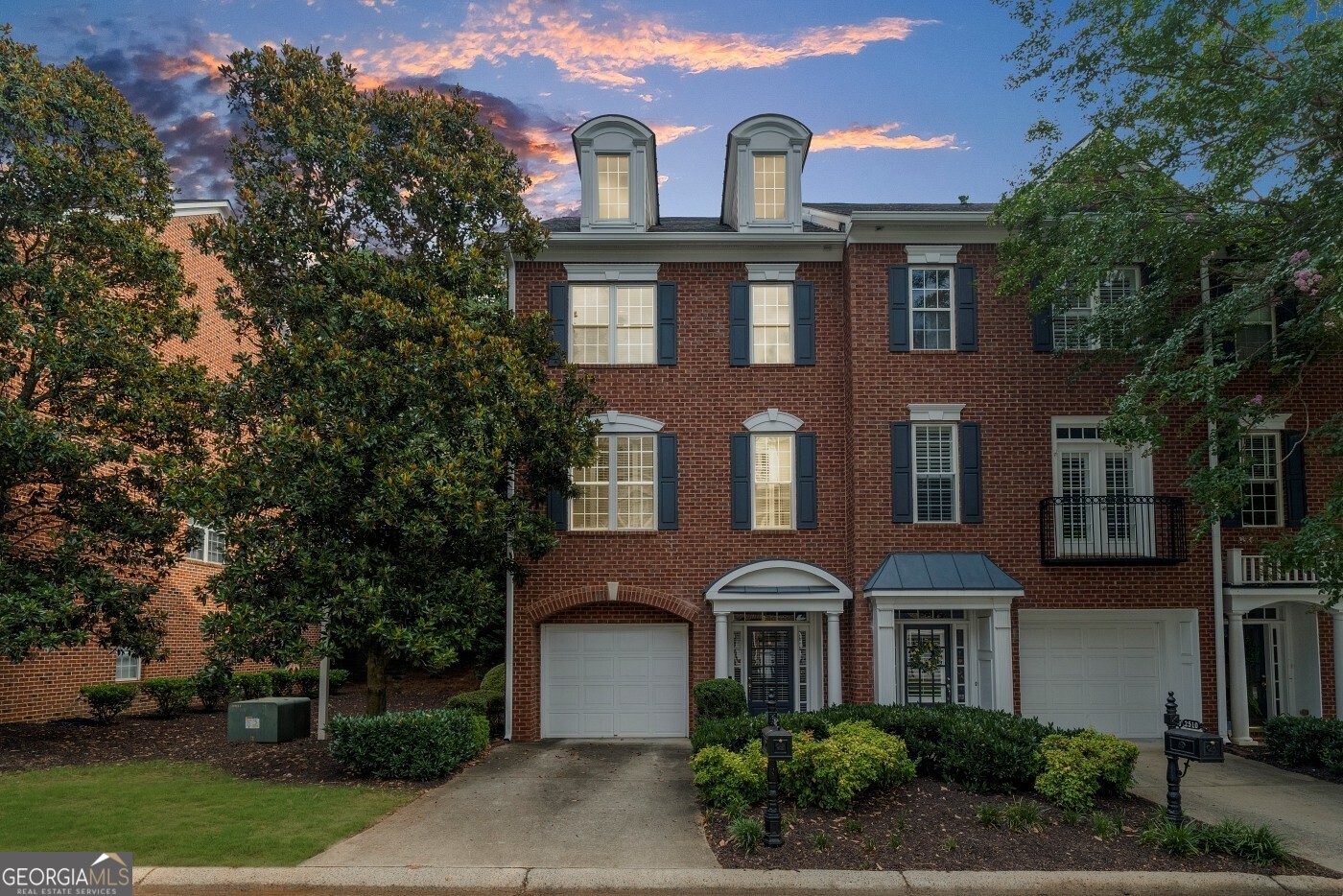 Welcome to 2512 Waters Edge Trail, a beautifully updated end-unit townhome located on a spacious corner lot in one of Roswell's most desirable gated communities. This three-level home offers the perfect blend of style, functionality, and location, just minutes from popular shops, restaurants, parks, and everything downtown Roswell has to offer. Inside, you'll find two oversized bedrooms and two and a half bathrooms, with a flexible floor plan that suits a variety of lifestyles. The expansive primary suite features a large walk-in closet, a soaking tub, a walk-in shower, and a private nook that's ideal for a home office or cozy reading area. On the second floor, a generous flex space offers endless possibilities for a media room, home gym, or additional workspace. The main living area is warm and inviting, with custom built-in shelving, a freshly painted fireplace, and a designer accent wall in the dining area. The kitchen features brand new countertops and updated light fixtures that add a modern, elegant touch. Natural light fills the space thanks to the home's end-unit positioning, providing extra windows and a bright, airy feel throughout. The garage includes additional storage and offers potential to add another bedroom or bathroom. Additional upgrades include a brand new AC unit and walk-in closets in both bedrooms. This townhome is the perfect combination of convenience, comfort, and contemporary finishes, all within a quiet, secure community in the heart of Roswell. Don't miss this exceptional opportunity to call it home.
