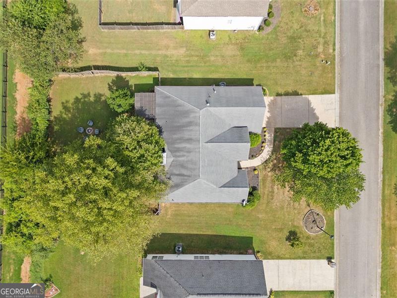 Beautiful ranch-style home in the desirable Polo Fields subdivision! This well-maintained 3 bed, 2 bath home features a spacious split-bedroom layout with open-concept living and dining areas. Enjoy a cozy fireplace, a large kitchen with pantry, and a private primary suite with walk-in closet. Relax on the covered patio overlooking the level backyard - perfect for entertaining. Conveniently located just minutes from I-75, Lake Allatoona, Georgia Highlands College, schools, shopping, and restaurants. Low HOA make this an ideal primary home or investment opportunity. Don't miss it!