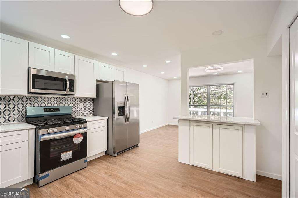 Photo of 4201 Regal Ridge Road, Austell, GA 30106 (MLS # 10680475)