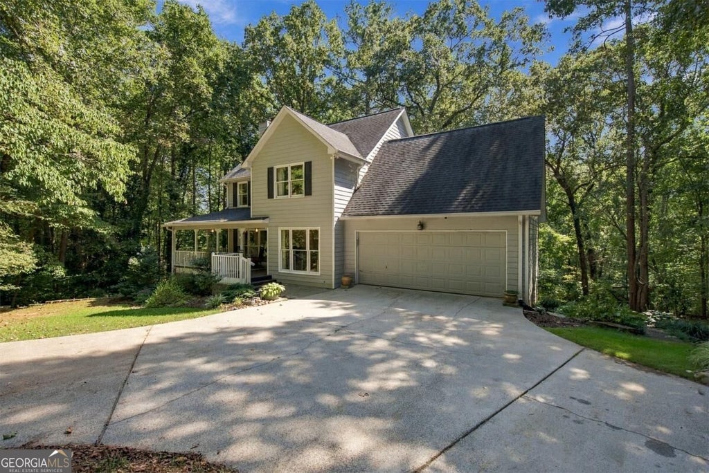 Photo of 2038 Laurel Cove, Ball Ground, GA 30107 (MLS # 10848488)