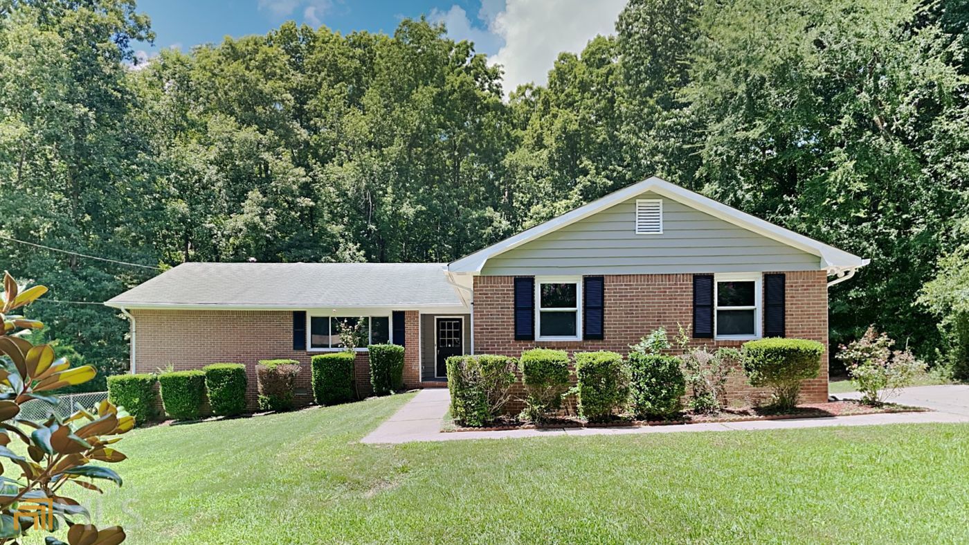 Come see this very cozy ranch home in Stockbridge! This home has fresh paint throughout, new flooring through entire home and new quartz countertops. It features a cozy fireplace, and open kitchen, a big screened-in porch and a large family room. Come make an offer today!