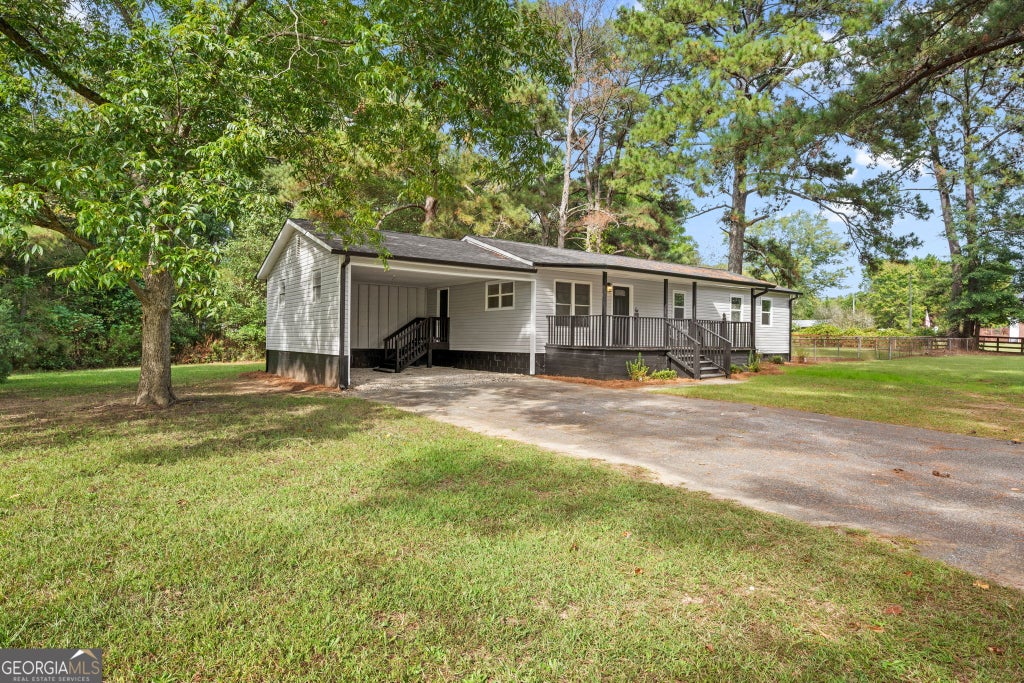 Photo of 2563 Highway 81 E, McDonough, GA 30252 (MLS # 10870441)