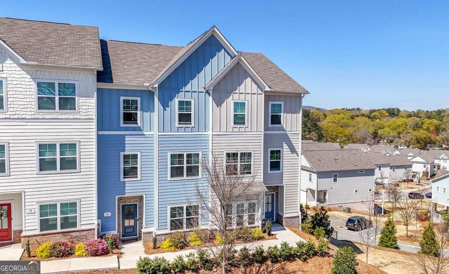 This stunning 3-story townhome, built in 2022, offers the space and feel of a single-family home with all the perks of low-maintenance living. With approx. 2,500 square feet, this home is larger than many of the single-family homes in the community. You will enjoy HOA-covered exterior maintenance, landscaping, roof care, and termite bonds. Step inside to discover a flex space on the first floor, perfect for a guest suite, home gym, or additional living area, complete with a convenient half bath. The main level is an entertainer's dream. The expansive living space includes a large kitchen with ample cabinet storage, generous counter space, a spacious island with storage on both sides, and a breakfast bar. The formal dining area easily accommodates a table for 8 or more - much larger than what you'll find in most single-family homes. There's also a dedicated office with French doors for privacy when working from home, a sun-filled family room featuring a custom feature wall and large windows that flood the space with natural light, and a huge back deck that is perfect for entertaining or unwinding. Hardwood floors run throughout the first and second levels, adding warmth and elegance. Upstairs, the third floor offers a massive primary suite with a spa-like bathroom featuring a grand tiled shower and an ENORMOUS walk-in closet - the largest you will likely see in a townhome! Two secondary bedrooms share a well-appointed bathroom, and there's also a walk-in laundry room and a separate linen closet for added convenience.  Located in the 2020 Obie Award-Winning Community of the Year, this neighborhood offers sidewalks, dog parks, and ample guest parking in a lot just across from the property. Location is everything! From the large back deck, enjoy serene views of Kennesaw Mountain. You're just 5 minutes from Marietta Square, where you can shop, dine, and enjoy entertainment at Marietta Square Market, an 18,500-square-foot food hall. The Drafty Dane, a 21,000-square-foot dog park and bar, is within walking distance, while The Battery Atlanta, home of the Braves, Cumberland Mall, dining, and nightlife, is only 10 minutes away. Don't miss the chance to enjoy the best of space, style, and convenience in one of Marietta's most sought-after communities.   This home also qualifies for a specialty lending program with significantly lower interest rates through our preferred lender. Schedule your tour today!