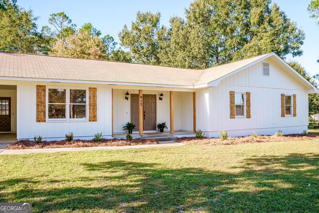 Photo of 412 Oasis Drive, Dublin, GA 31021 (MLS # 10880064)