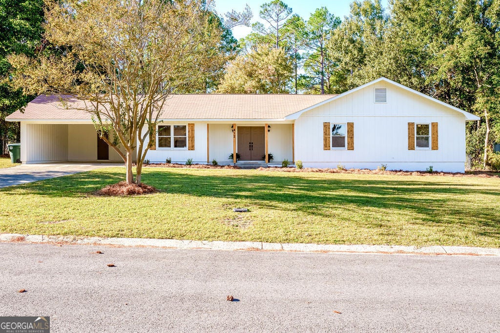 Photo of 412 Oasis Drive, Dublin, GA 31021 (MLS # 10880064)