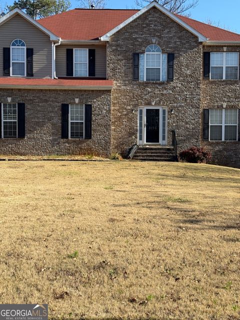 Photo of 3136 SW CLARIDGE Drive, Conyers, GA 30094 (MLS # 10655127)