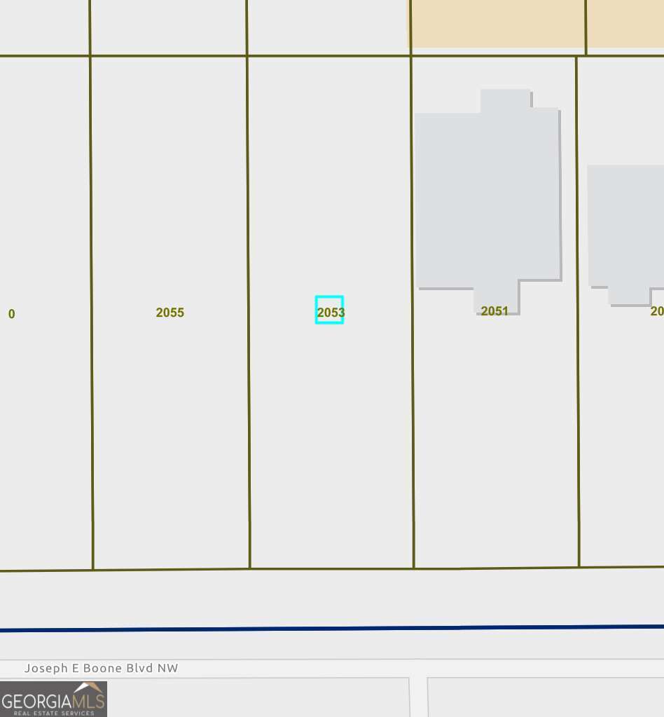 One of two adjacent C-1 lots for sale in Grove Park in the Westside Park Affordable workforce housing overlay. Lot Measures 50' x 150'
