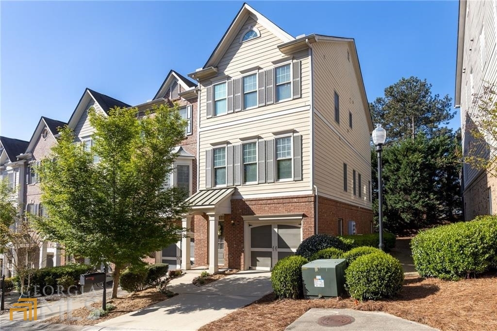 All the modern luxuries in this beauty, located right inside the perimeter. This wonderful end-unit townhome has an abundance of natural light, and plenty of space for entertaining. Gorgeous modern kitchen with updated tile backsplash, stainless steel appliances, island, pantry AND breakfast area, that looks over the dining room and great room complete with bookcases and fireplace. You're going to love sitting on the back second story deck, enjoying the beautiful weather and grilling out. This home has gorgeous details of crown molding found all through home. Hardwood floors on main level, updated light fixtures new windows, newer HVAC and new carpets on first floor basement area. The finished basement has a private full bathroom and plenty of flex space for office, Rec room or additional bedroom or workout. You're going to love the large master suite, complete with private. spa like bath with dual vanities and huge soaker tub, and oversized shower. Walk down the hall and find another bathroom with another full bathroom. Refrigerator, washer and dryer are included with rental as a courtesy. WOW! LOCATION LOCATION EASY ACCESS TO SMYRNAS WEST VILLAGE THE BATTERY AND MIDTOWN. Easy on and off 285. APPLICANT MUST HAVE MINIMUM CREDIT SCORE OF 650 ABOVE. PROOF OF INCOME, NO PAST EVICTIONS AND CLEAR BACKGROUND WHICH WILL ALL BE RUN. ONE MONTHS SECUIRTY AND FIRST AND LAST MONTHS PAYMENT AT MOVE IN AND RENTERS INSURANCE REQUIRED. call 919-606-6062