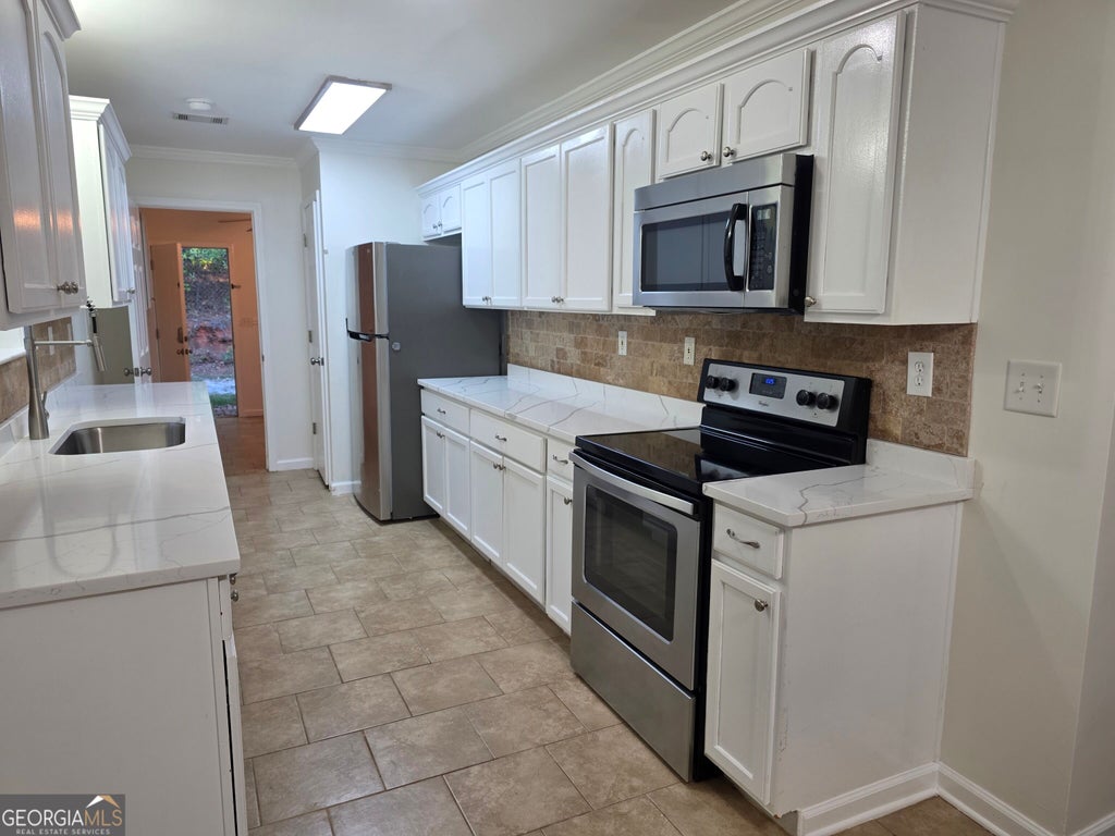 Photo of 852 Hines Road, Moreland, GA 30259 (MLS # 10854725)