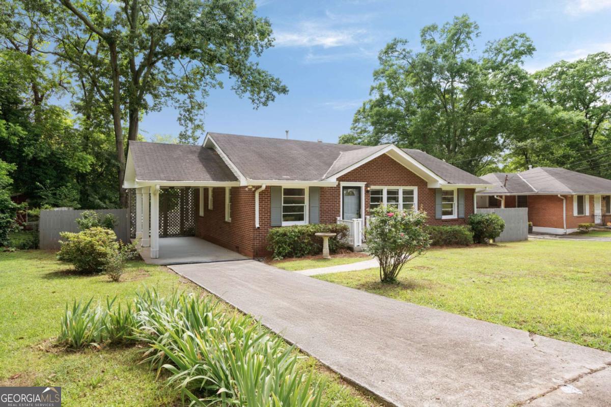 Receive $4500 in closing costs, when using Preferred Lender! Welcome Home ATL to this charming Midway Woods retreat nestled on quiet, tree-lined Monticello Place, where cheerful curb appeal and timeless character greet you the moment you arrive. Hardwood floors flow effortlessly throughout, creating an inviting ambiance, while the renovated kitchen, complete with updated cabinetry. A third bedroom, thoughtfully positioned as a pass-through space, offers an ideal home office, creative studio, or cozy den. Unwind after a long day or host lively gatherings on the spacious screened-in porch, a true standout feature perfect for dinner parties or cheering on your favorite team. Step out onto the adjoining deck to savor stunning sunsets overlooking the fully fenced, flat backyard, an ideal canvas for gardening, entertaining, or simply relaxing beneath the stars. This beloved home sits in the heart of friendly Midway Woods, eligible for the sought-after Museum School, and is conveniently close to Legacy Park, Dearborn Park, and vibrant Downtown Decatur. With welcoming neighbors, proximity to community favorites, and no city taxes, this special property promises the lifestyle you've been dreaming of. Do not wait-your new chapter begins here!