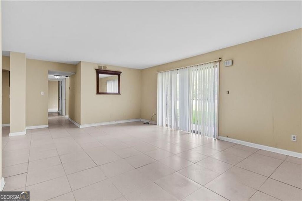 Photo of 115 Camelot Drive, Atlanta, GA 30349 (MLS # 10670607)