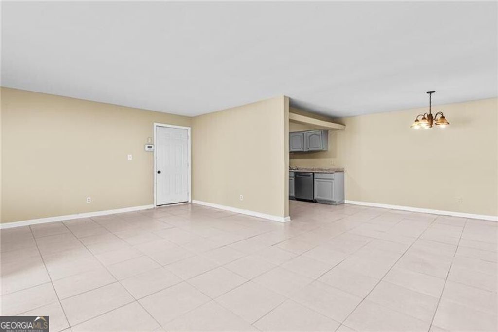 Photo of 115 Camelot Drive, Atlanta, GA 30349 (MLS # 10670607)