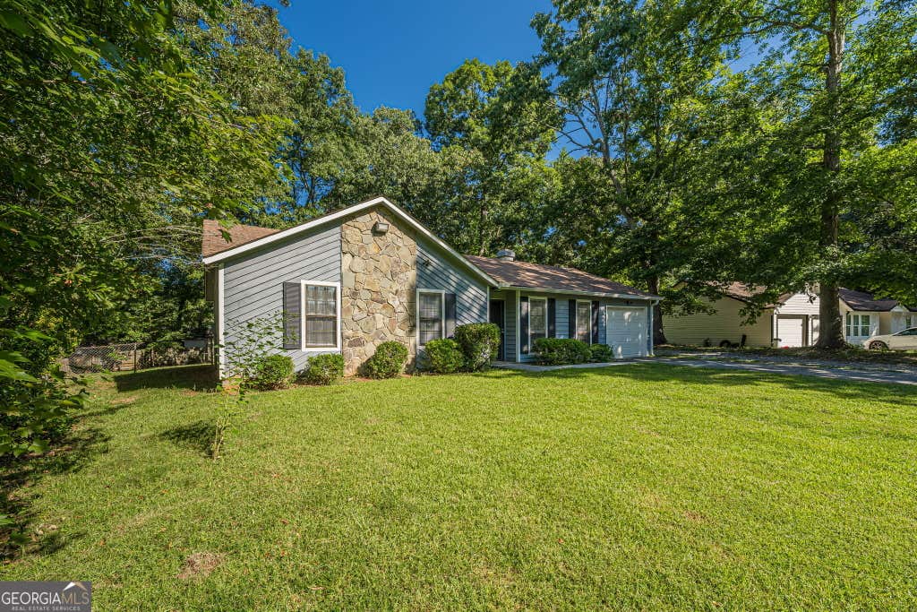 Photo of 5350 Greenhedge Trail, Stone Mountain, GA 30088 (MLS # 10833640)