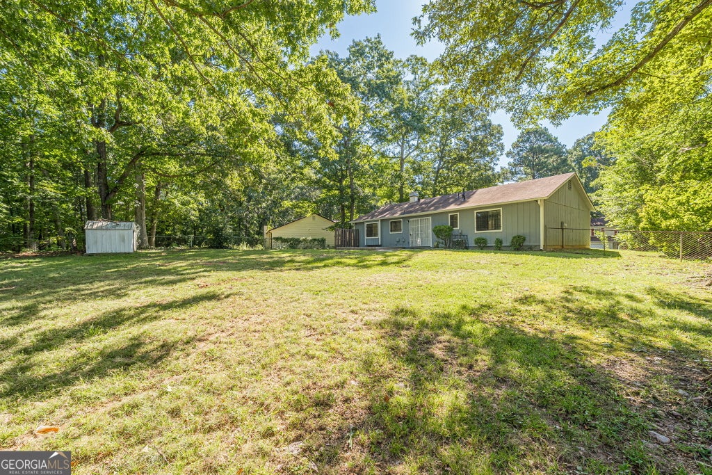 Photo of 5350 Greenhedge Trail, Stone Mountain, GA 30088 (MLS # 10833640)