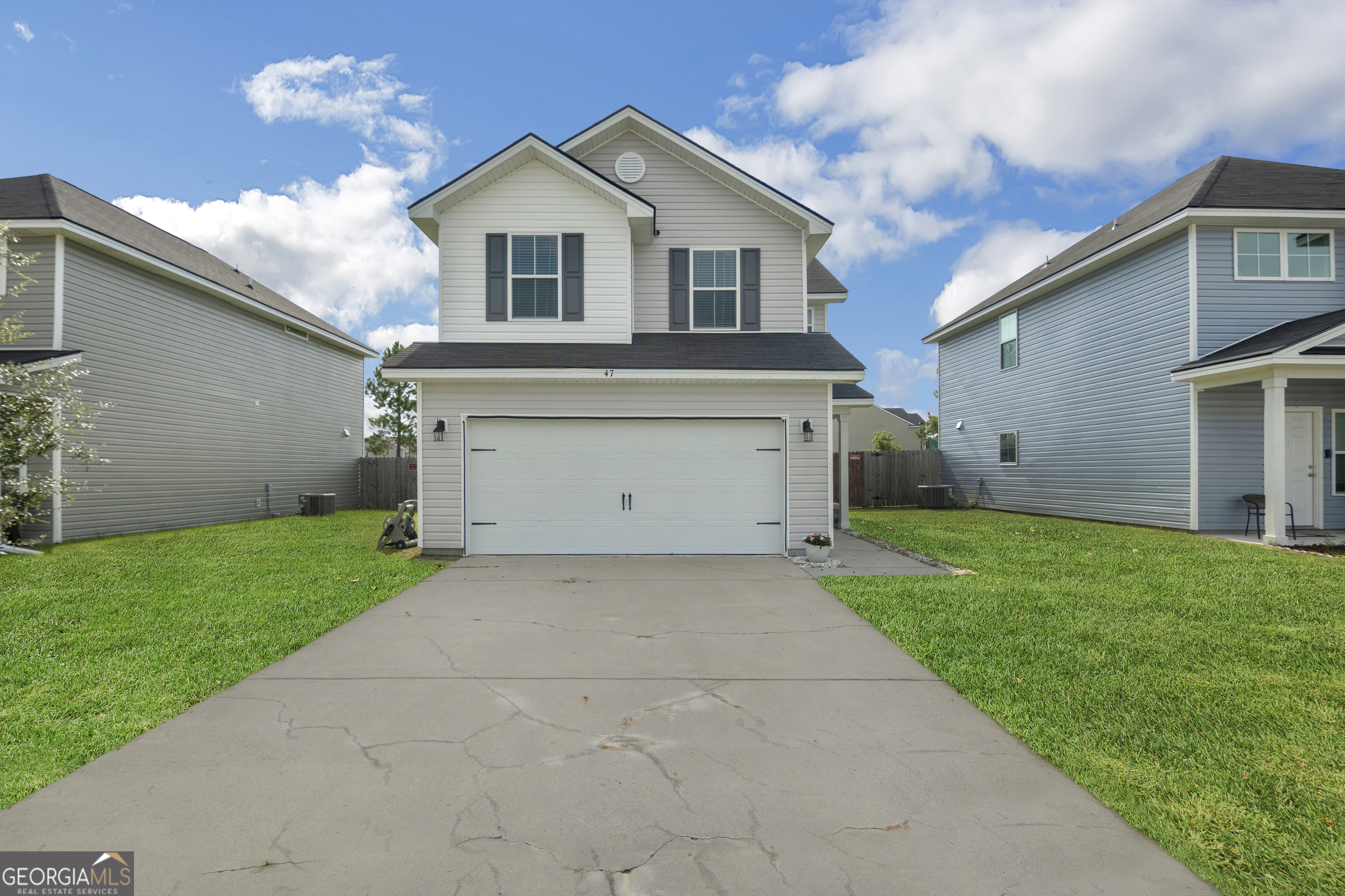 Welcome to this beautifully maintained 2-story home located just outside Fort Stewart Gate 7 in the desirable Independence Settlement neighborhood. Built in 2020 and owned by only two families, this 3-bedroom, 2.5-bath home features durable LVP flooring throughout the main level and cozy carpet upstairs. Enjoy a spacious kitchen with granite countertops, perfect for entertaining. The master suite boasts a walk-in closet, double vanities, a soaking tub, and a separate shower. Additional highlights include a 2-car garage and a fully privacy-fenced backyard-ideal for outdoor living. Don't miss this move-in ready gem just minutes from base, shopping, and schools!