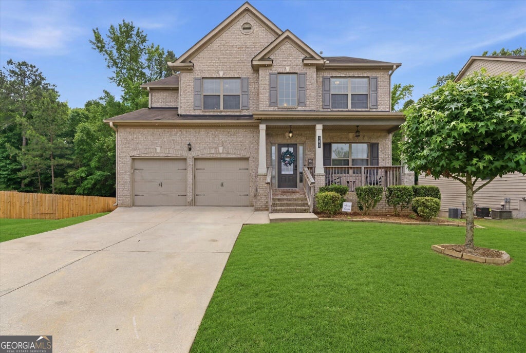 Photo of 192 Madison Grace Avenue, McDonough, GA 30252 (MLS # 10879755)