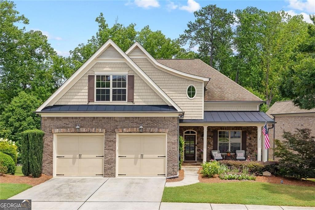 Start your next chapter here at prestigious Brookhaven at Johns Creek - Active Adult 55+ Community! Award winning Ansley I floor plan is well known for the smart and spacious design. This home has been LOVINGLY and METICULOUSLY maintained. The MAIN LEVEL truly shines with beautiful hardwood floors that flow seamlessly through the open-concept living areas. Private OFFICE/study has abundant natural light and overlooks the pretty front porch. FAMILY ROOM features a gas fireplace flanked by attractive built-in bookcases, ready for your favorite photos and cherished collections. You'll love entertaining friends and family in the gourmet remodeled KITCHEN with new top-of-the-line Kitchen Aid appliances; beautiful cabinets that offer ample storage, granite countertops and under-cabinet lighting. DINING area features enough space to easily seat 8 (or more) guests. PRIMARY SUITE is extremely spacious with huge walk-in shower, double sink vanity with granite countertops and linen tower for storage. The custom closet is simply fabulous, providing organized space for your wardrobe. LANAI offers a private and tranquil wooded view and is perfect for watching TV, reading, dining, or just relaxing. The EZBreeze energy efficient windows are easy to open/close. You'll love the stacked stone fireplace. The adjacent grill deck makes barbecuing easy and convenient. UPSTAIRS, you'll find a spacious and elegant master-guest suite. This large bedroom is versatile enough to include a sitting area, a comfortable sleeping area, a private full bath, and a cozy reading nook. Plus, there's an incredibly spacious and convenient heated and cooled walk-in storage area - perfect for seasonal items. The TERRACE level expands your living possibilities even further. It offers flexible recreation space, another spacious guest-master suite with a full bathroom, and an incredible workshop/storage area for your projects and hobbies. And for the wine enthusiast, a dedicated wine room provides cooled storage for over 900 bottles, alongside an inviting dining and tasting area - perfect for any kind of party! A sense of COMMUNITY is so important to an Active Adult lifestyle. This community offers resort-like amenities that enhance your lifestyle. Enjoy the pool, well-appointed clubhouse, state-of-the-art fitness center, tennis and PICKLEBALL courts, community garden, and scenic walking trails. You'll love the many planned activities - a wonderful way to meet neighbors and friends. CONVENIENCE is key!! Easy access to a variety of restaurants, shopping destinations, Emory hospital and medical facilities, and several golf courses and country clubs. Come and check this out - the perfect combination of classy design, practical comfort and a vibrant community.