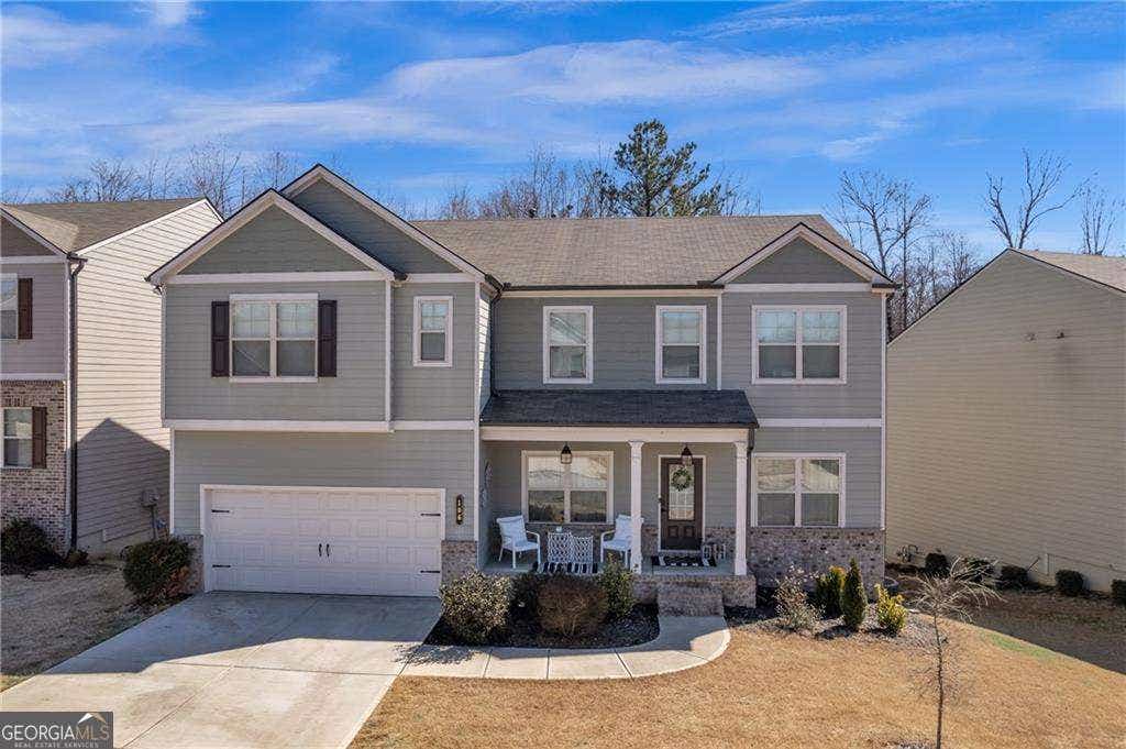 Photo of 106 Creekside Bluff Way, Auburn, GA 30011 (MLS # 10826820)