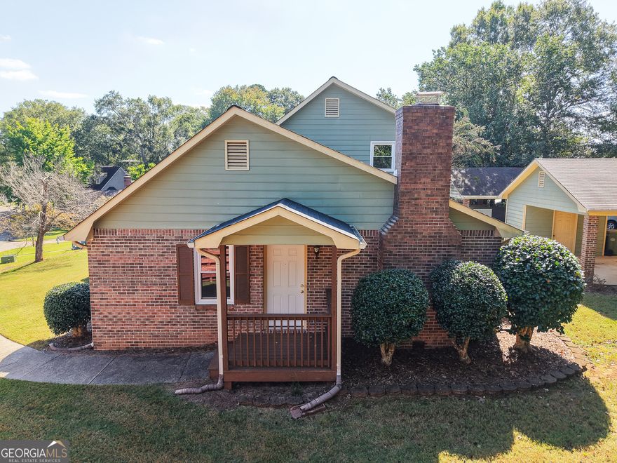 Four sided brick beauty boasting 3 bedrooms and 3 full baths!  Alley way entrance leads you from the carport, across the patio and into the bright and inviting family room.  The kitchen is recently renovated with a breakfast bar, newer appliances, and a pretty tile backsplash.  The mud room has cabinets, a counter for folding clothes, and a separate door leading out back.  The open floor plan and soaring ceilings make the living area spacious.  The owners retreat is tucked at the end of the hallway.  Inside you will find a walk-in closest, a separate vanity area, walk-in shower, and glass doors leading to the deck.  The third bedroom is a private suite located upstairs with it's own bath and walk-in closet.  The roof, exterior doors, and windows  were replaced in 2016.  The A/C was replaced in 2022 and is under a bi-annual service agreement. A surprising feature of the home is the abundant storage including linen closets, walk-in closets, and a storage shed off the carport.  This home is conveniently located to all Carrollton has to offer.  Welcome HOME!