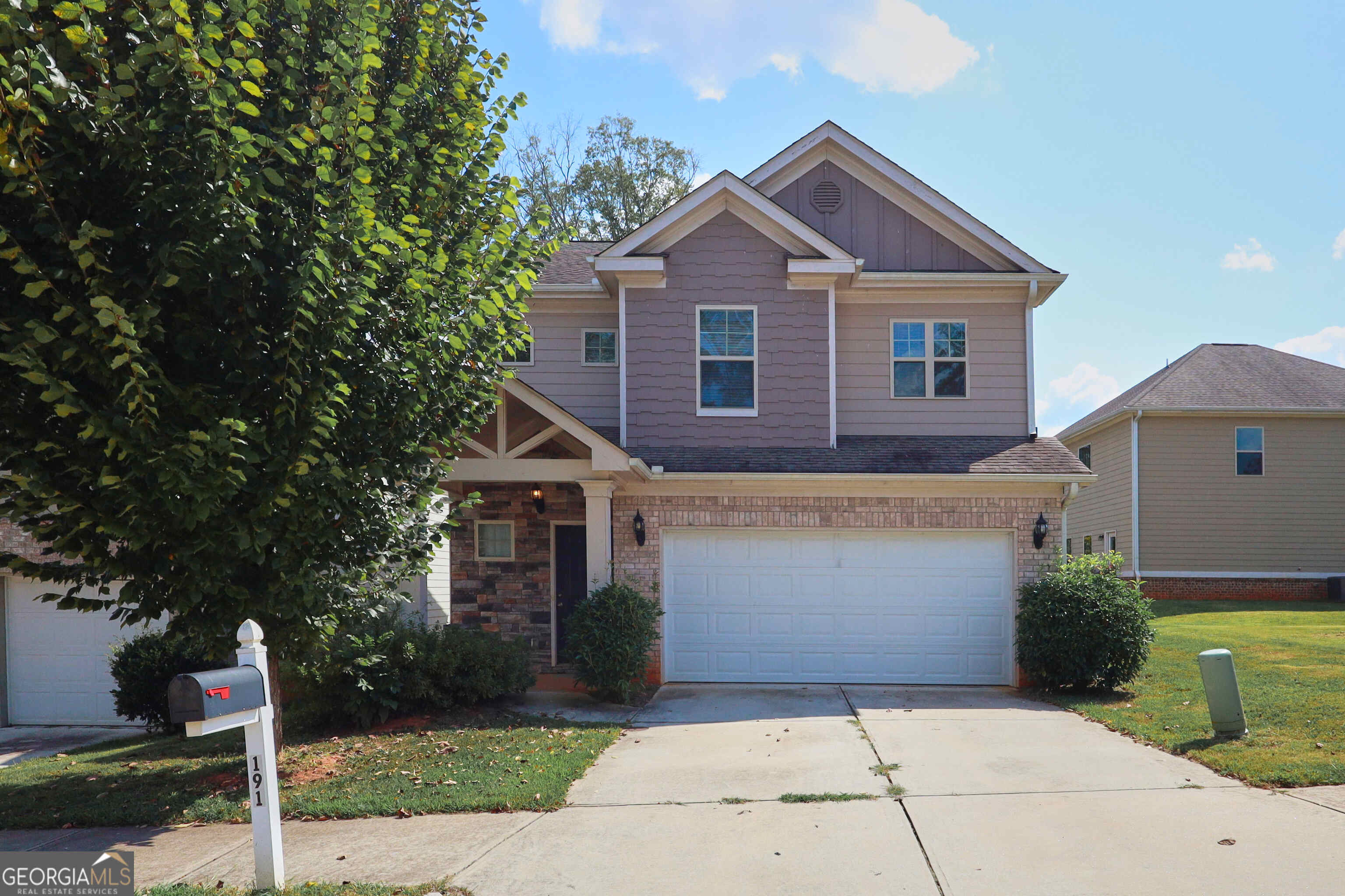 Welcome to 191 Daisy Circle, a charming single-family residence nestled in the heart of McDonough, Georgia. This spacious 1,990-square-foot home offers 3 bedrooms and 2.5 bathrooms, providing ample space for comfortable living. As you step inside, you'll be greeted by an open floor plan, creating an airy and inviting atmosphere. The main level boasts wood flooring. The kitchen is a chef's delight, equipped with designer 42-inch white cabinets crowned with molding, granite countertops, and modern appliances, including a refrigerator and range. The master suite offers a tranquil retreat with a garden tub and a separate walk-in shower, perfect for unwinding after a long day. 2 spacious secondary bedrooms on second floor. Close to shopping, dining, and I-75. HOA has no rental restrictions.