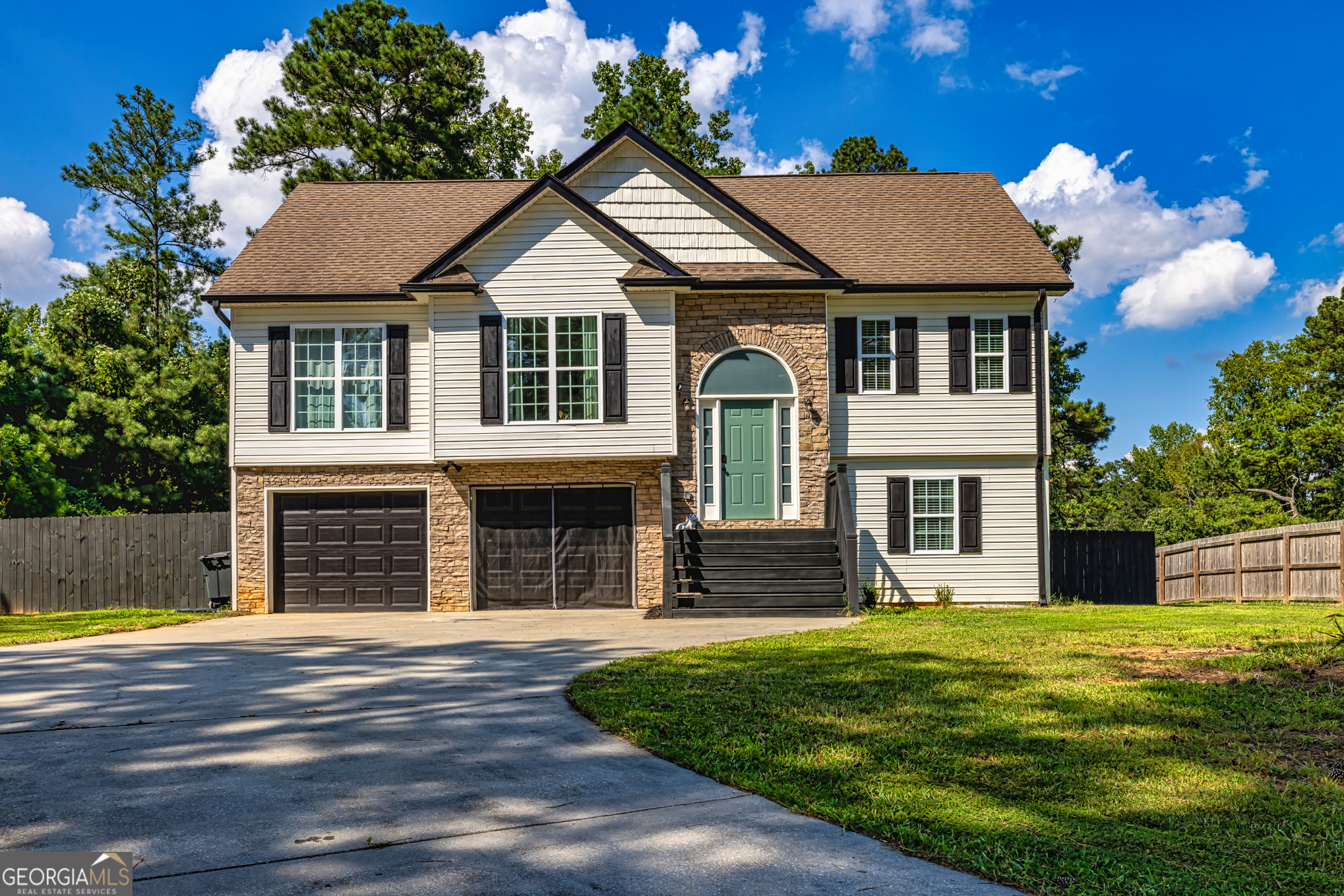 Welcome to 420 Whooping Creek Road! This beautifully updated home offers 4 spacious bedrooms and 3 full baths, providing comfort and style for the whole family. Step inside to find a bright and inviting floor plan with modern finishes throughout. The heart of the home features an updated kitchen with sleek cabinetry, stainless steel appliances, and plenty of counter space. The primary suite is a true retreat with a spa-like bathroom, while the additional bedrooms offer comfort and versatility. A highlight of this property is the media room-perfect for movie nights, entertaining guests, or creating your own private escape. Every detail has been thoughtfully upgraded, making this home truly move-in ready. Situated in a desirable location with a blend of privacy and convenience, 420 Whooping Creek Road is ready to welcome your home.