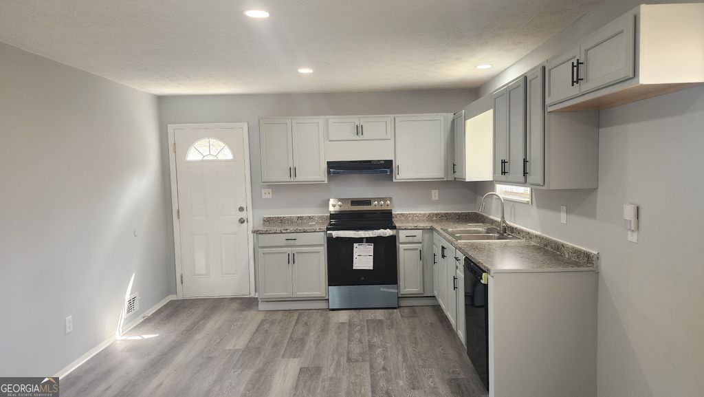 Photo of 8423 Avalon Drive, Riverdale, GA 30274 (MLS # 10708621)