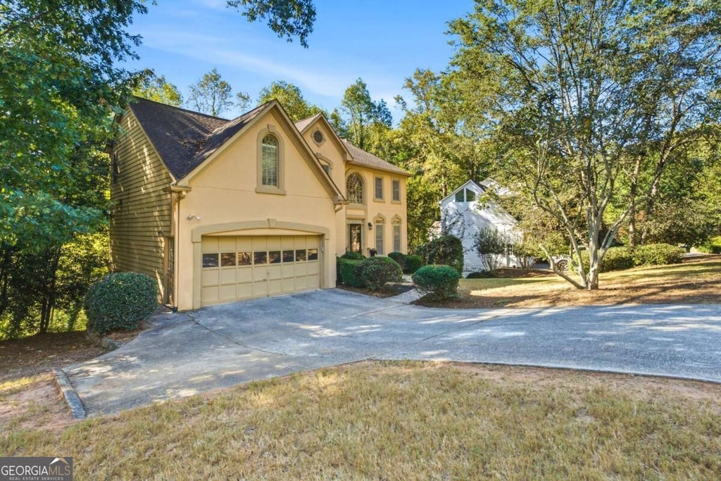Photo of 437 Connemara Crossing, Lawrenceville, GA 30044 (MLS # 10876816)
