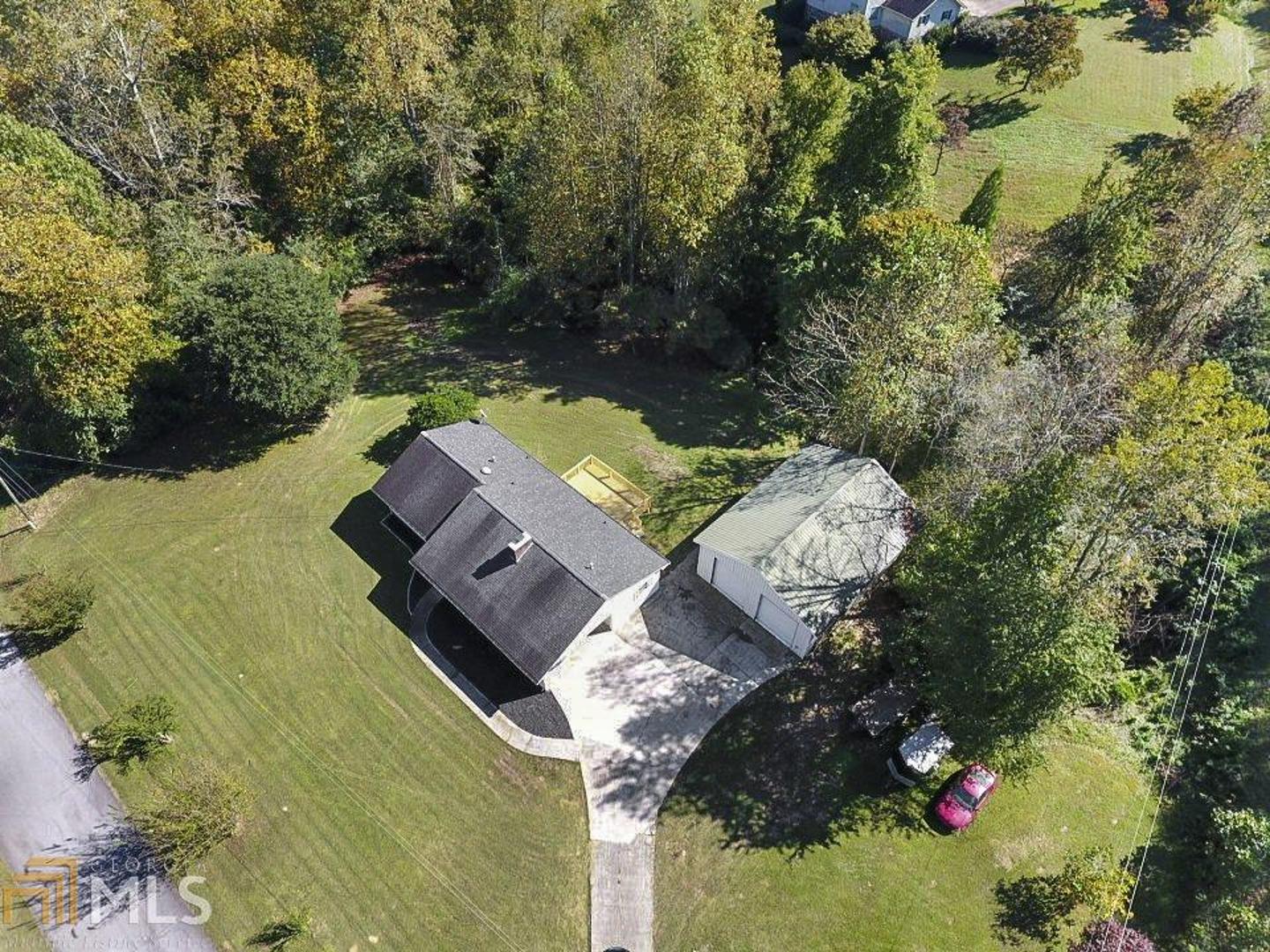 Great Ranch home nestled on 1.13-acre level corner lot. It has a newly back deck with lots of privacy. It has a HUGE workshop with roll up doors and has plenty of space for a lift and many electrical outlets. It has a finished room that can be used as another bedroom or office space! Both bathrooms have been renovated, the master bathroom has water proof flooring. It has beautiful hardwood floors throughout the main living and hallway.