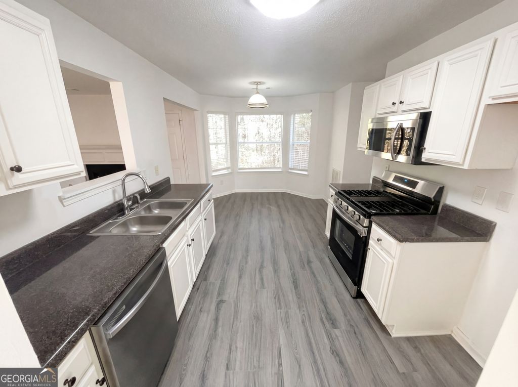 Photo of 6876 Wildboar Drive, Fairburn, GA 30213 (MLS # 10685163)