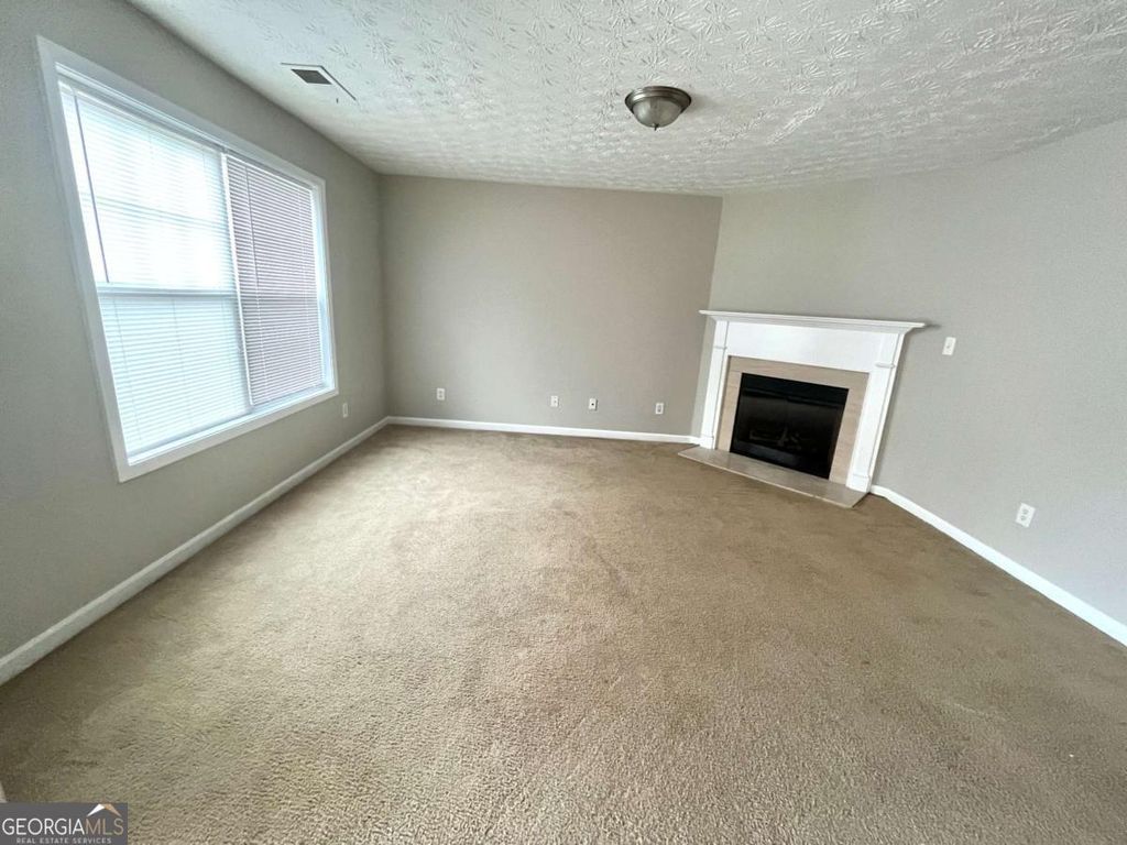 Photo of 1453 Little Creek Drive #1453, Lawrenceville, GA 30045 (MLS # 10686058)