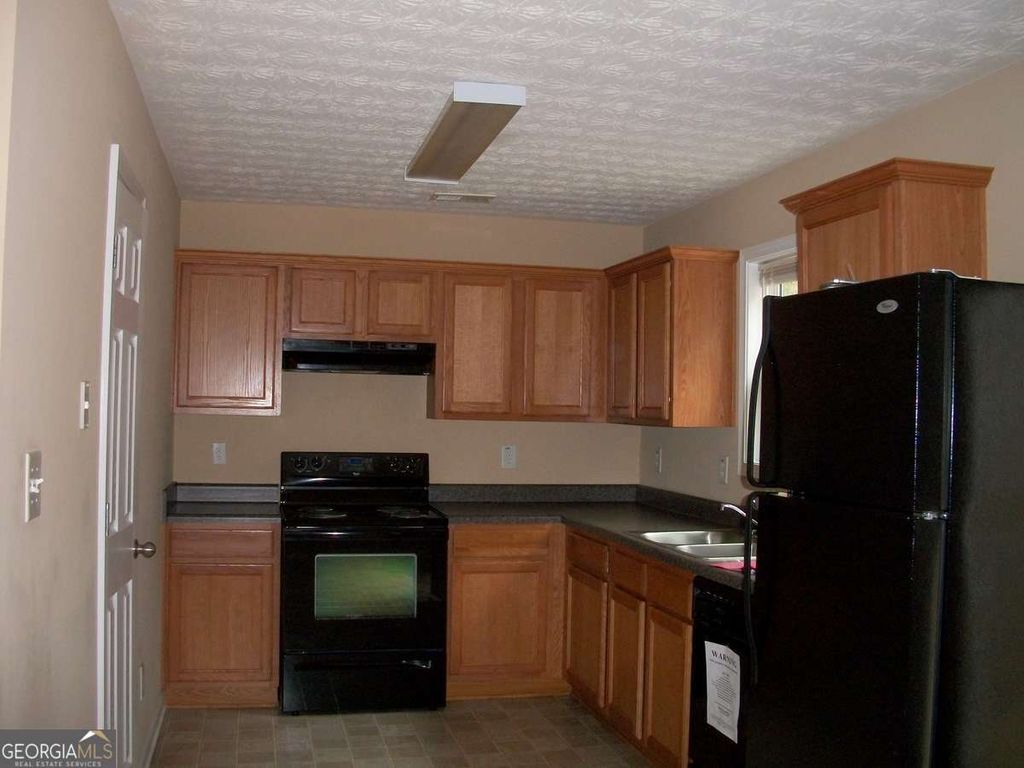 Photo of 1453 Little Creek Drive #1453, Lawrenceville, GA 30045 (MLS # 10686058)