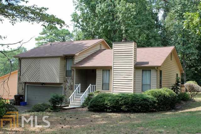 Spacious home on nearly half an acre in cul-de-sac! As you enter int this home, you will notice the great room to the right. The great room offers a stone fireplace, lots of windows, and opens into the formal dining room. The kitchen is spacious with breakfast nook, and there is access to the back deck that overlooks the large backyard. Upstairs are two secondary bedrooms that share a hall bath and the master. The master is large with a private bath and walk in closet with custom cabinets. The garage is oversized with a partial basement.